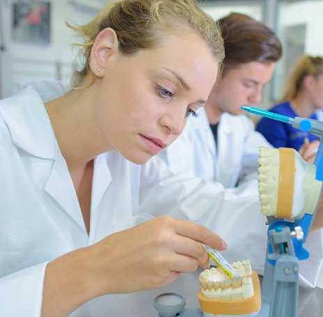 Lab technicians making dentures