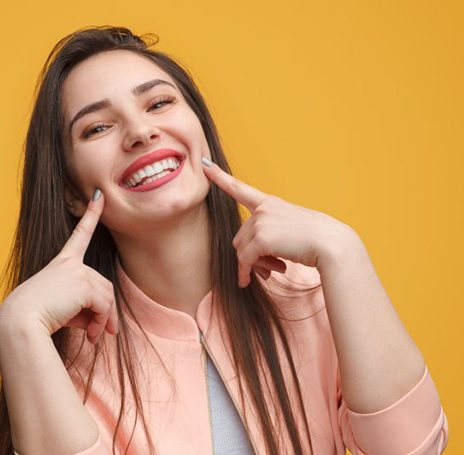 Lady shows off pretty smile?