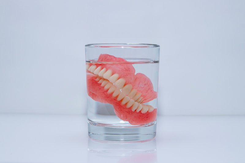 Dentures soak in liquid